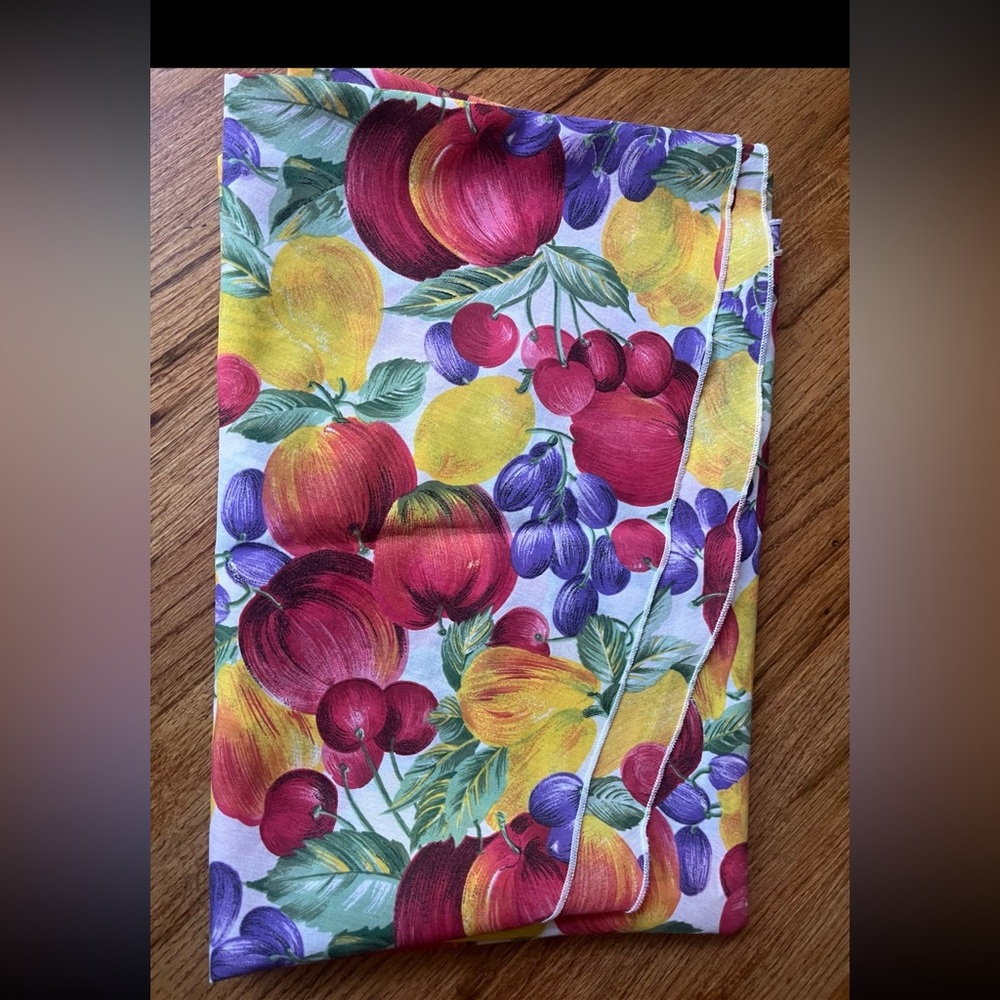 Colorful Fruit tablecloth approx 70 inches round.